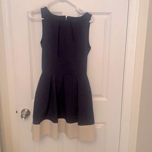 Navy blue with off-white bottom trim dress by closet London.